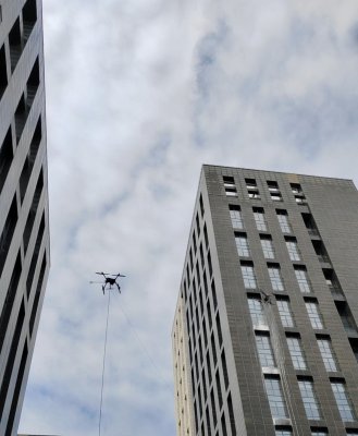 迈优威双机协同：高低搭配，重新定义高空清洁